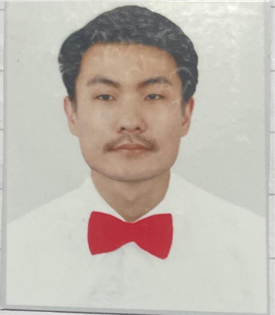 Mr. Roshan Garbuja Pun