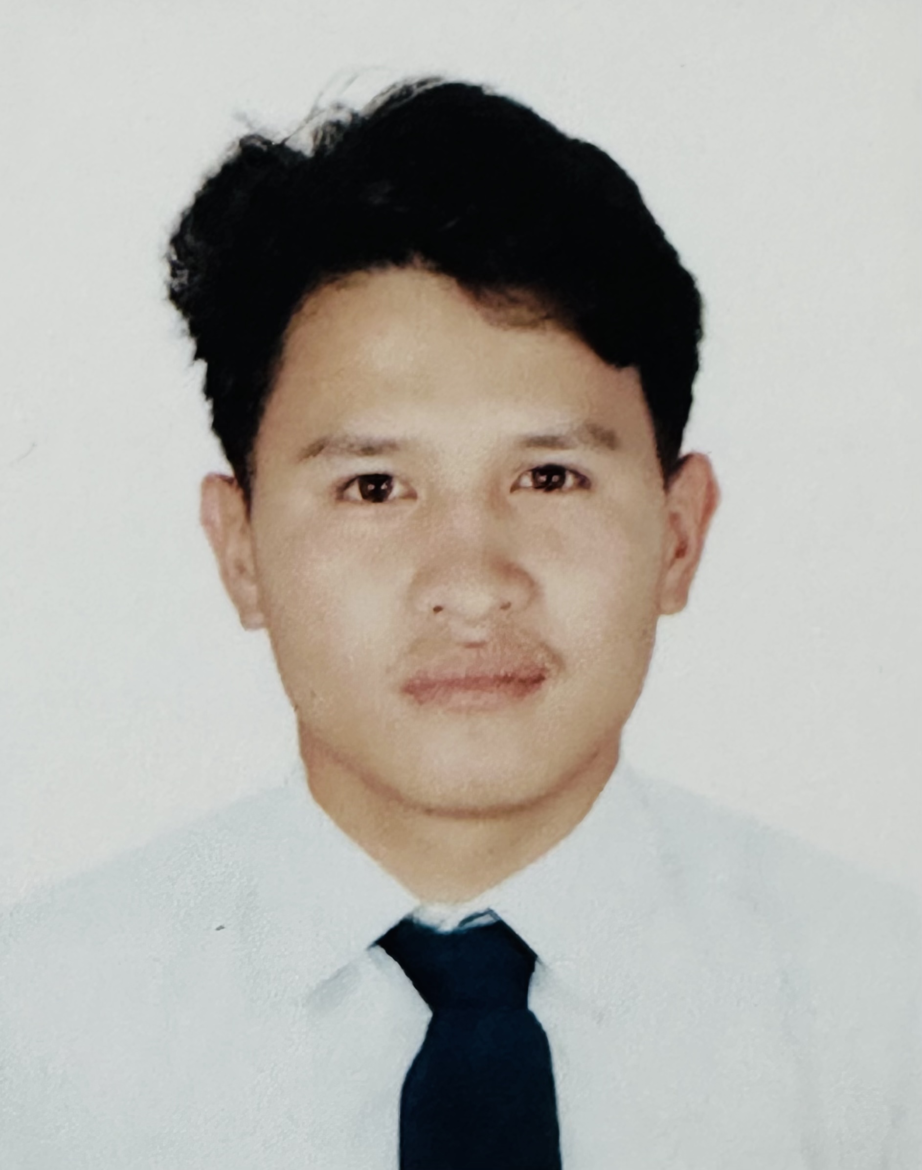 Mr. Roshan Bahadur Thapa Magar