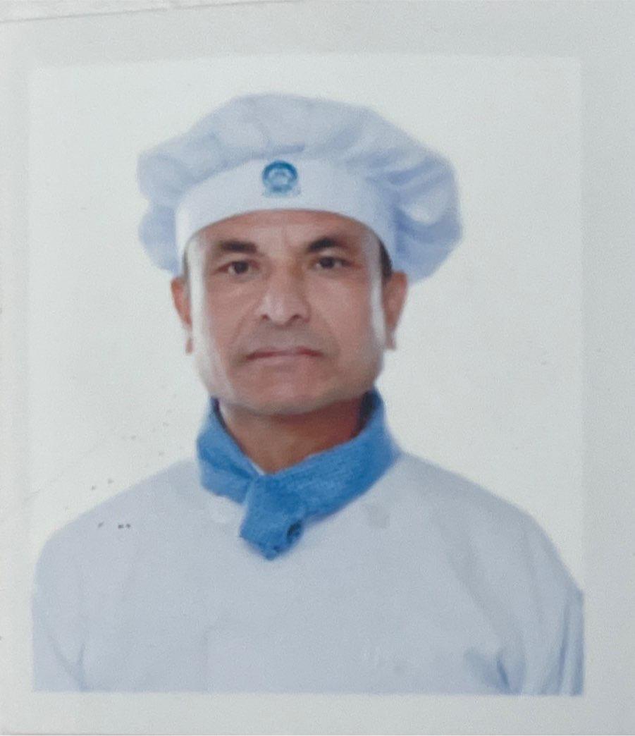 Mr. Dhan Bahadur Adhikari