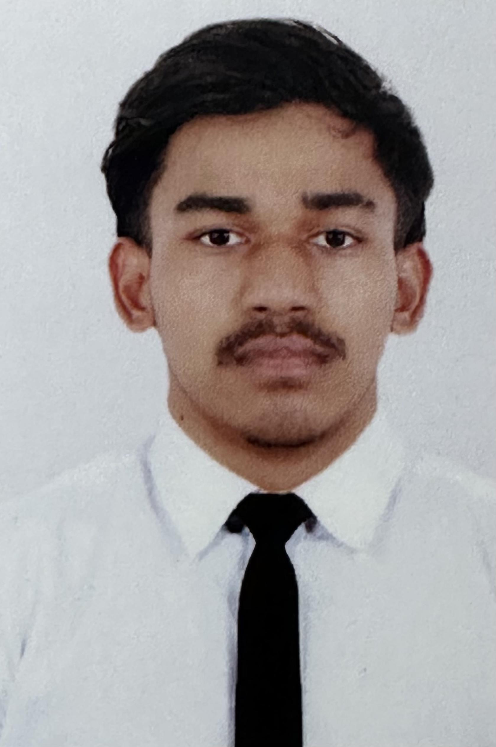 Mr. Roshan Bhujel